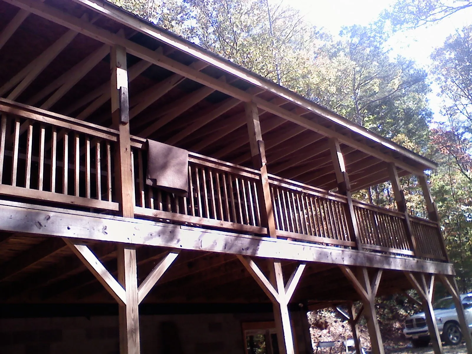Timber framing under a new elevated porch and deck — Roof Leak Repair in Big Prairie by Roofing Brothers